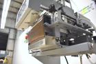 Used Bosch Doboy Semi-Automatic Bag Top Labeler, Model JSL.  Heat seals a paper header label to the top of a premade bag.  Speed Up to 30 bags / min.  Label width; 2.5