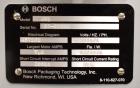 Used Bosch Doboy Semi-Automatic Bag Top Labeler, Model JSL.  Heat seals a paper header label to the top of a premade bag.  Speed Up to 30 bags / min.  Label width; 2.5