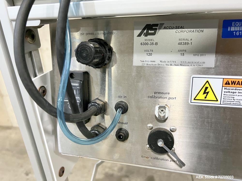 Used Accu-Seal Bag Impulse Sealer, Model 6300-35-B. Seal length 34" maximum x 3/8" width. Has HMI. Mounted on modular frame with casters. 1/60/120 volt, 15amp Power Requirement. Serial# 48389-1, Buil...