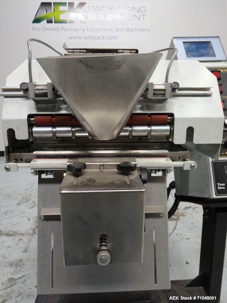 Used Audion Automation Model Titan 6500 Rollbag Automatic Bagger and Sealer