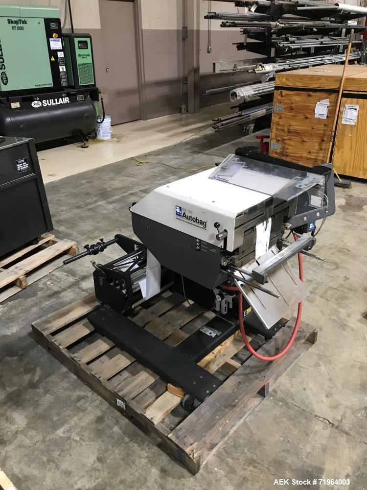 Used Automated Packaging Systems Autobag Model AB 180 Bagger. Capable of up to 80 bags per minute. Has bag size range of 2" to 11" Wide X 3" to 22" Long, bag thickness of 1.0 to 4.0 mil, and Pass-thr...