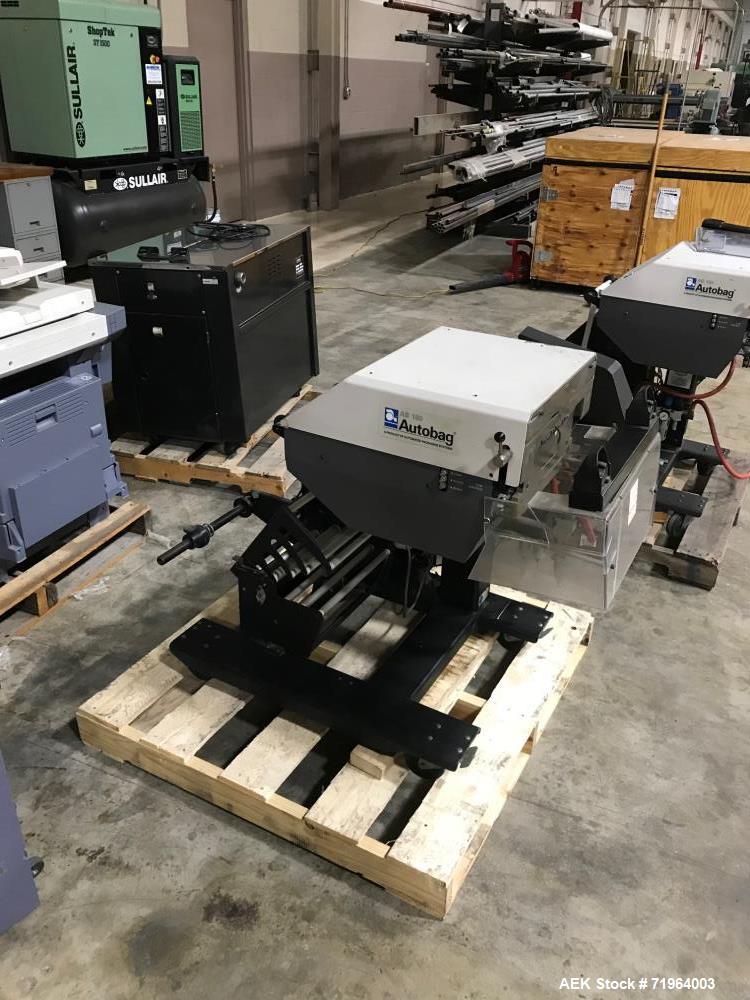 Used Automated Packaging Systems Autobag Model AB 180 Bagger. Capable of up to 80 bags per minute. Has bag size range of 2" to 11" Wide X 3" to 22" Long, bag thickness of 1.0 to 4.0 mil, and Pass-thr...