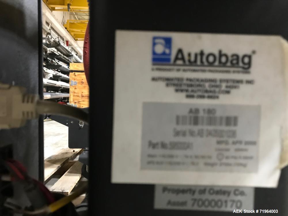 Used Automated Packaging Systems Autobag Model AB 180 Bagger. Capable of up to 80 bags per minute. Has bag size range of 2" to 11" Wide X 3" to 22" Long, bag thickness of 1.0 to 4.0 mil, and Pass-thr...
