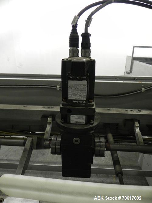Used DJS Systems VB50 50" Vertical Bagger. Automatic vertical L-bar sealer with automatic infeed cross conveyor. Minimum bag 6" x 6", max bag 49" wide x 17 1/2" heigh (50" x 20" seal bar). Approximat...