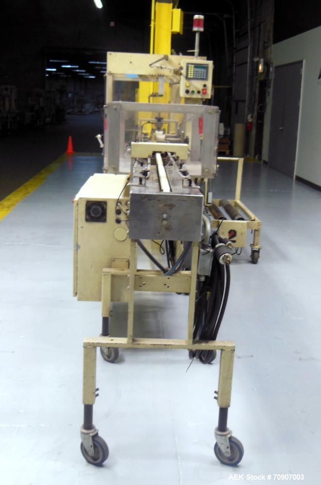 Used Rennco Model 501-36 Automatic Vertical Bagger