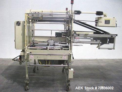 Used Rennco Dual 501-36 Vertical L-Bar Sealer. 36" Horizontal and 8" vertical seal bars, dual sided machine (left and right), requires infeed, equipped with film registration, static eliminator, hole...