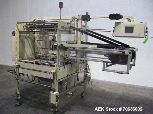 Used Rennco Dual 501-36 Vertical L-Bar Sealer. 36" Horizontal and 8" vertical seal bars, dual sided machine (left and right), requires infeed, equipped with film registration, static eliminator, hole...