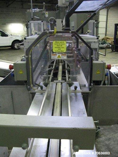 Used Rennco Dual 501 Vertical L-Bar Sealer with model CCL (cup counter loader). Horizontal seal approximately 36" wide, vertical seal is approximately 22" long. Has scrap removal and dual cleated 24"...