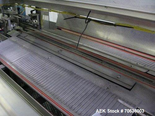 Used Rennco Dual 501 Vertical L-Bar Sealer with model CCL (cup counter loader). Horizontal seal approximately 36" wide, vertical seal is approximately 22" long. Has scrap removal and dual cleated 24"...