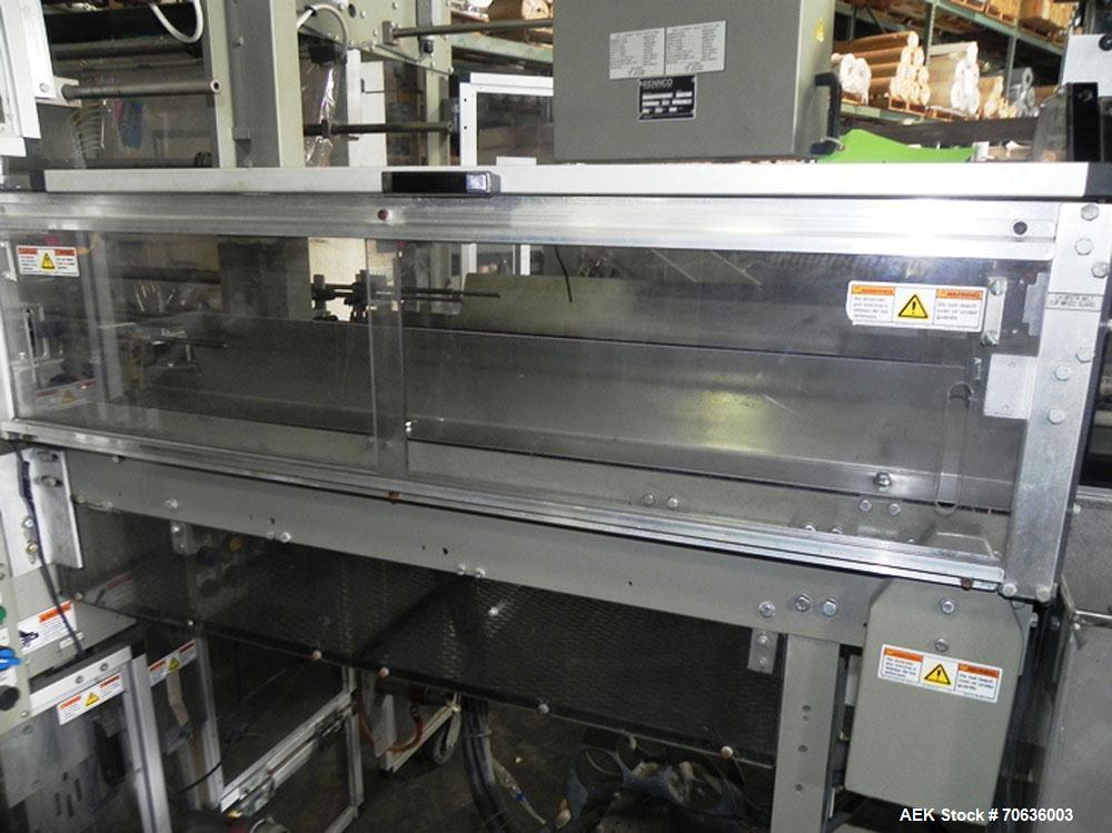 Used Rennco Dual 501 Vertical L-Bar Sealer with model CCL (cup counter loader). Horizontal seal approximately 36" wide, vertical seal is approximately 22" long. Has scrap removal and dual cleated 24"...