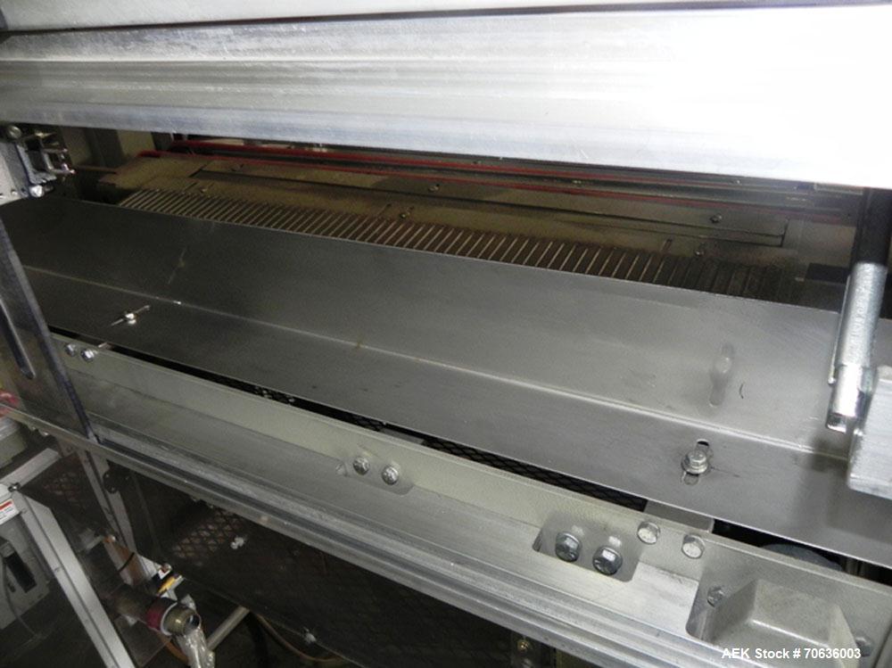 Used Rennco Dual 501 Vertical L-Bar Sealer with model CCL (cup counter loader). Horizontal seal approximately 36" wide, vertical seal is approximately 22" long. Has scrap removal and dual cleated 24"...