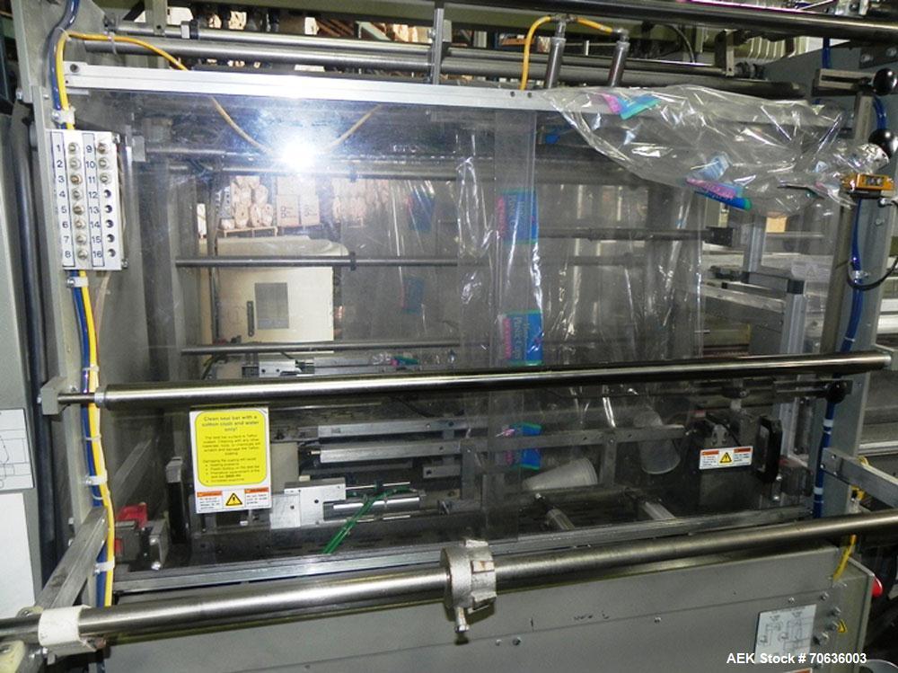 Used Rennco Dual 501 Vertical L-Bar Sealer with model CCL (cup counter loader). Horizontal seal approximately 36" wide, vertical seal is approximately 22" long. Has scrap removal and dual cleated 24"...