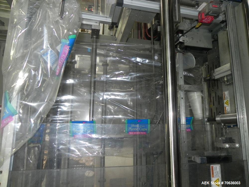 Used Rennco Dual 501 Vertical L-Bar Sealer with model CCL (cup counter loader). Horizontal seal approximately 36" wide, vertical seal is approximately 22" long. Has scrap removal and dual cleated 24"...