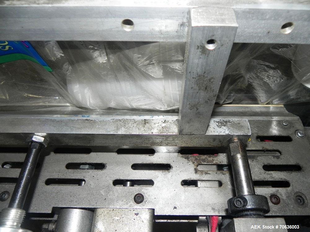 Used Rennco Dual 501 Vertical L-Bar Sealer with model CCL (cup counter loader). Horizontal seal approximately 36" wide, vertical seal is approximately 22" long. Has scrap removal and dual cleated 24"...