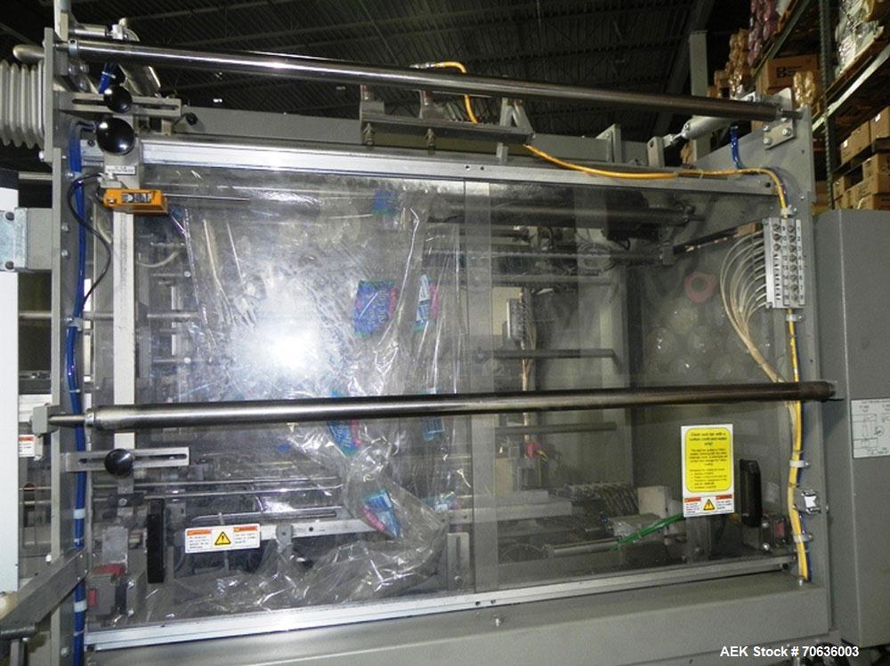 Used Rennco Dual 501 Vertical L-Bar Sealer with model CCL (cup counter loader). Horizontal seal approximately 36" wide, vertical seal is approximately 22" long. Has scrap removal and dual cleated 24"...