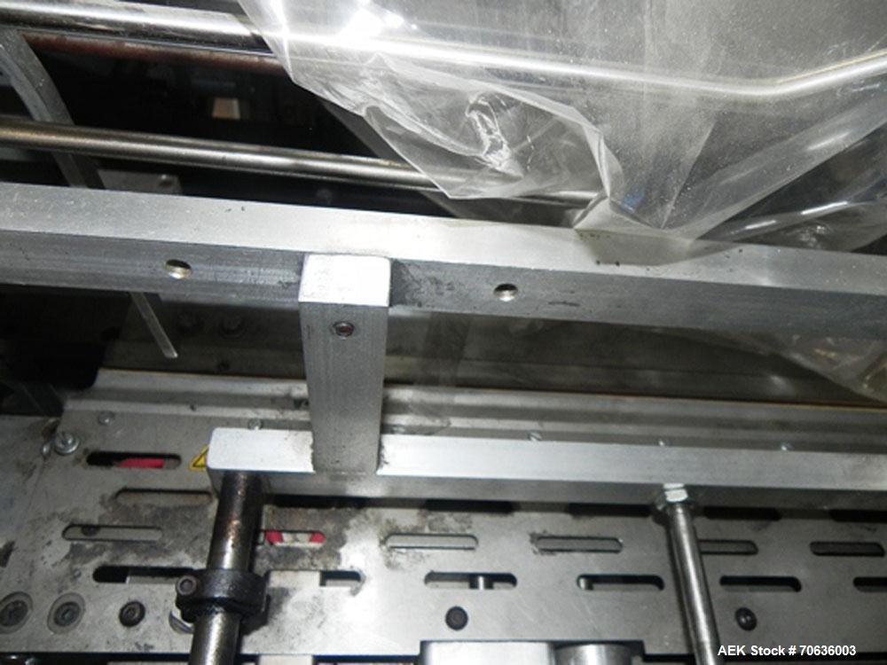 Used Rennco Dual 501 Vertical L-Bar Sealer with model CCL (cup counter loader). Horizontal seal approximately 36" wide, vertical seal is approximately 22" long. Has scrap removal and dual cleated 24"...