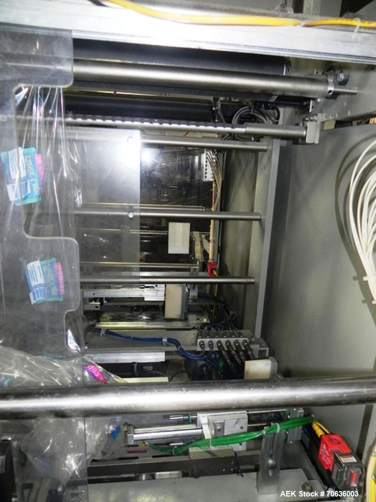 Used Rennco Dual 501 Vertical L-Bar Sealer with model CCL (cup counter loader). Horizontal seal approximately 36" wide, vertical seal is approximately 22" long. Has scrap removal and dual cleated 24"...