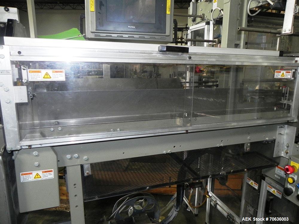 Used Rennco Dual 501 Vertical L-Bar Sealer with model CCL (cup counter loader). Horizontal seal approximately 36" wide, vertical seal is approximately 22" long. Has scrap removal and dual cleated 24"...