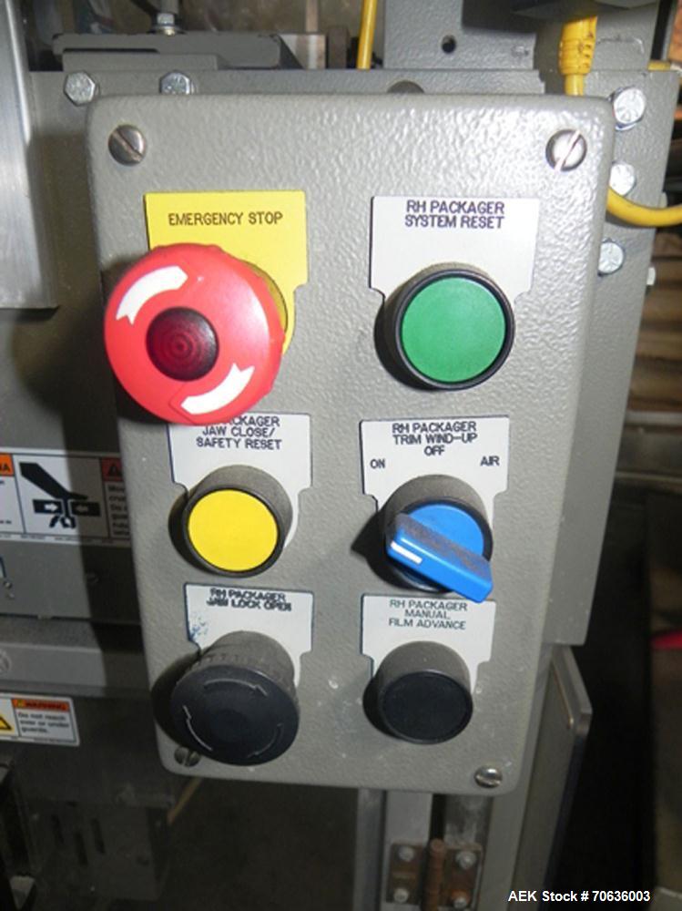 Used Rennco Dual 501 Vertical L-Bar Sealer with model CCL (cup counter loader). Horizontal seal approximately 36" wide, vertical seal is approximately 22" long. Has scrap removal and dual cleated 24"...