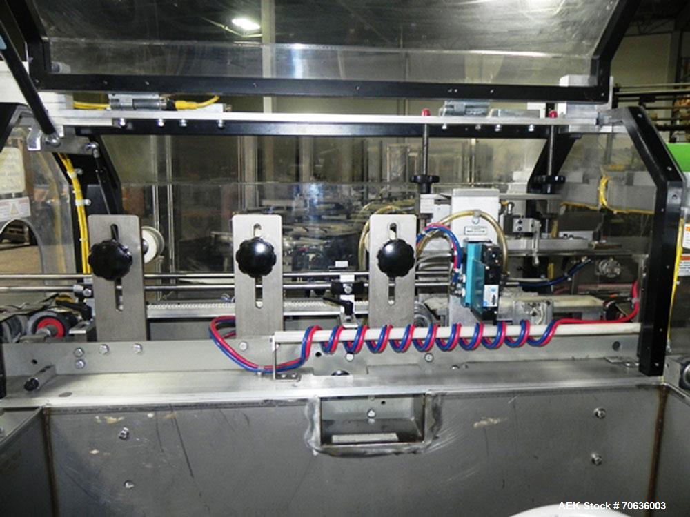 Used Rennco Dual 501 Vertical L-Bar Sealer with model CCL (cup counter loader). Horizontal seal approximately 36" wide, vertical seal is approximately 22" long. Has scrap removal and dual cleated 24"...