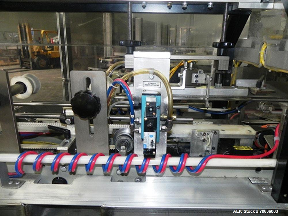 Used Rennco Dual 501 Vertical L-Bar Sealer with model CCL (cup counter loader). Horizontal seal approximately 36" wide, vertical seal is approximately 22" long. Has scrap removal and dual cleated 24"...