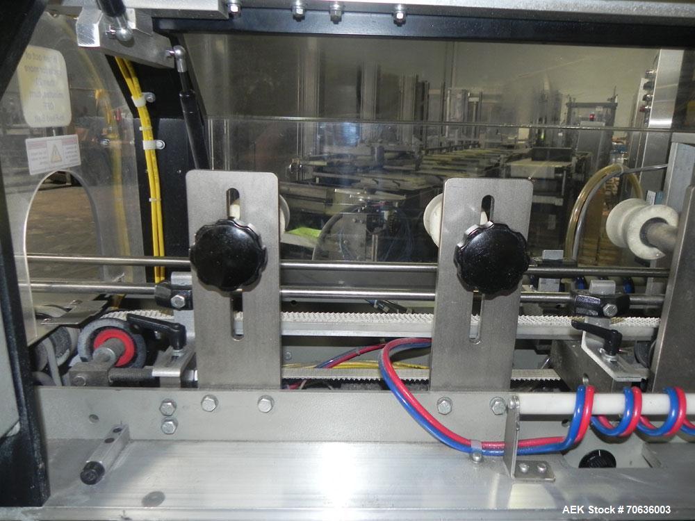 Used Rennco Dual 501 Vertical L-Bar Sealer with model CCL (cup counter loader). Horizontal seal approximately 36" wide, vertical seal is approximately 22" long. Has scrap removal and dual cleated 24"...