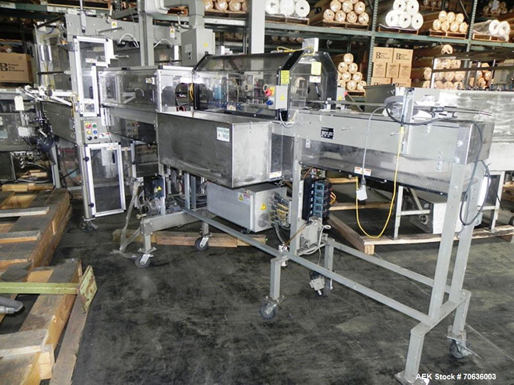 Used Rennco Dual 501 Vertical L-Bar Sealer with model CCL (cup counter loader). Horizontal seal approximately 36" wide, vertical seal is approximately 22" long. Has scrap removal and dual cleated 24"...