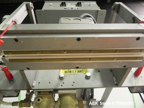 Used Vertrod Thermal Impulse Heat Sealer, Model 14P/PTV. Approximately 14” long heat sealing area, foot pedal controls.  1300 Watts, 115/120 volt AC.  Mounted on a carbon steel frame.