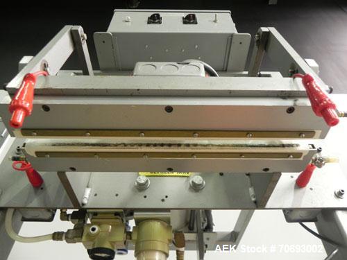 Used Vertrod Model 14P/PTV Thermal Impulse Heat Sealer.  Approximately 14" long heat sealing area, foot pedal controls. 1250 Watts, 115/120 volt AC.  Mounted on a carbon steel frame.