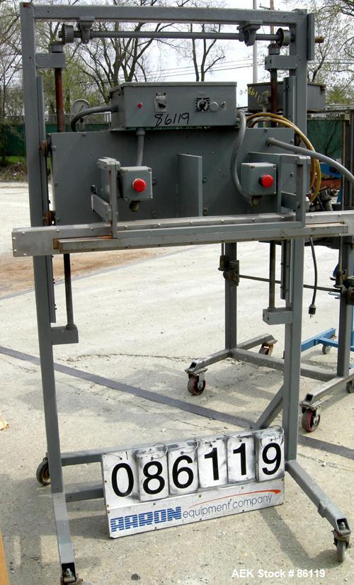 USED: Vertrod horizontal impulse heat sealing machine, model 36PPVS-1/4. 36" wide seal range. Manually adjustable height. Mounted on a carbon steel frame with casters.
