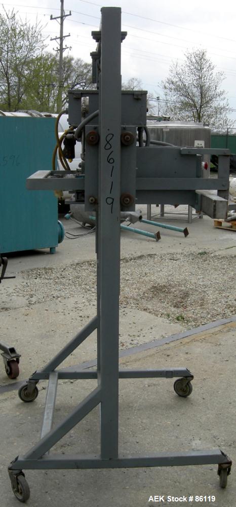 USED: Vertrod horizontal impulse heat sealing machine, model 36PPVS-1/4. 36" wide seal range. Manually adjustable height. Mounted on a carbon steel frame with casters.