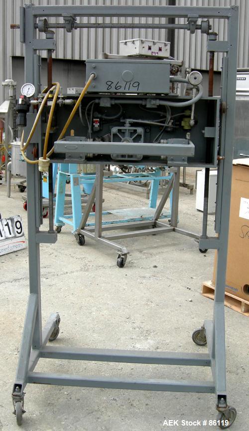 USED: Vertrod horizontal impulse heat sealing machine, model 36PPVS-1/4. 36" wide seal range. Manually adjustable height. Mounted on a carbon steel frame with casters.