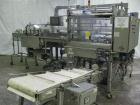 Used Rennco Dual 501 Vertical L-Bar Sealer with model CCL (cup counter loader). Horizontal seal approximately 36