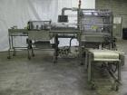 Used Rennco Dual 501 Vertical L-Bar Sealer with model CCL (cup counter loader). Horizontal seal approximately 36