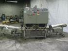 Used Rennco Dual 501 Vertical L-Bar Sealer with model CCL (cup counter loader). Horizontal seal approximately 36