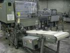 Used Rennco Dual 501 Vertical L-Bar Sealer with model CCL (cup counter loader). Horizontal seal approximately 36