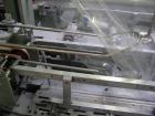 Used Rennco Dual 501 Vertical L-Bar Sealer with model CCL (cup counter loader). Horizontal seal approximately 36