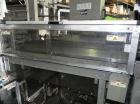 Used Rennco Dual 501 Vertical L-Bar Sealer with model CCL (cup counter loader). Horizontal seal approximately 36