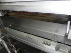 Used Rennco Dual 501 Vertical L-Bar Sealer with model CCL (cup counter loader). Horizontal seal approximately 36