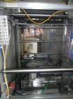 Used Rennco Dual 501 Vertical L-Bar Sealer with model CCL (cup counter loader). Horizontal seal approximately 36