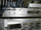 Used Rennco Dual 501 Vertical L-Bar Sealer with model CCL (cup counter loader). Horizontal seal approximately 36
