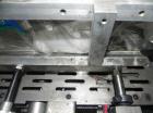 Used Rennco Dual 501 Vertical L-Bar Sealer with model CCL (cup counter loader). Horizontal seal approximately 36