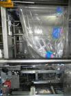 Used Rennco Dual 501 Vertical L-Bar Sealer with model CCL (cup counter loader). Horizontal seal approximately 36