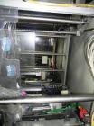 Used Rennco Dual 501 Vertical L-Bar Sealer with model CCL (cup counter loader). Horizontal seal approximately 36