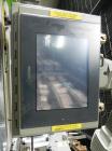 Used Rennco Dual 501 Vertical L-Bar Sealer with model CCL (cup counter loader). Horizontal seal approximately 36