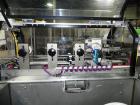 Used Rennco Dual 501 Vertical L-Bar Sealer with model CCL (cup counter loader). Horizontal seal approximately 36