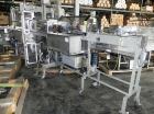 Used Rennco Dual 501 Vertical L-Bar Sealer with model CCL (cup counter loader). Horizontal seal approximately 36