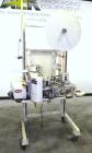 Used Doboy Model D-95A HD Bag Sewing System. Trims top of bag, folds tape over top of bag and stitches bags up to 50 linear feet per minute, can do a 1 or 2 thread stitch, and has a variable speed dr...