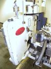 Used Doboy Model D-95A HD Bag Sewing System. Trims top of bag, folds tape over top of bag and stitches bags up to 50 linear feet per minute, can do a 1 or 2 thread stitch, and has a variable speed dr...