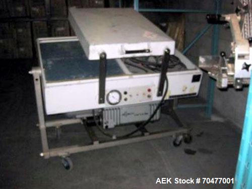 Used Multivac Dual Chamber Vacuum Packaging Machine, Model AG800. Packaging speed 2 to 3 cycles per minute. MAP Modified atmosphere packaging machine has a chamber size 24" x 30" x 3.75"deep. Include...